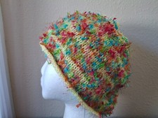 Hand knitted warm and fuzzy beanie/hat, light yellow with colors