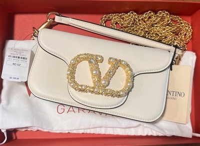 Valentino Garavani Small Loco bag in white leather with gold VLogo