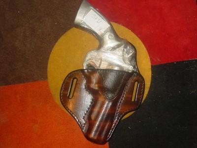 Smith & Wesson  19  4''  barrel   brown leather holster Kwik & Free