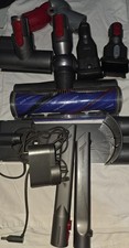 Dyson hair removal vanes and assorted vacuum attachments.