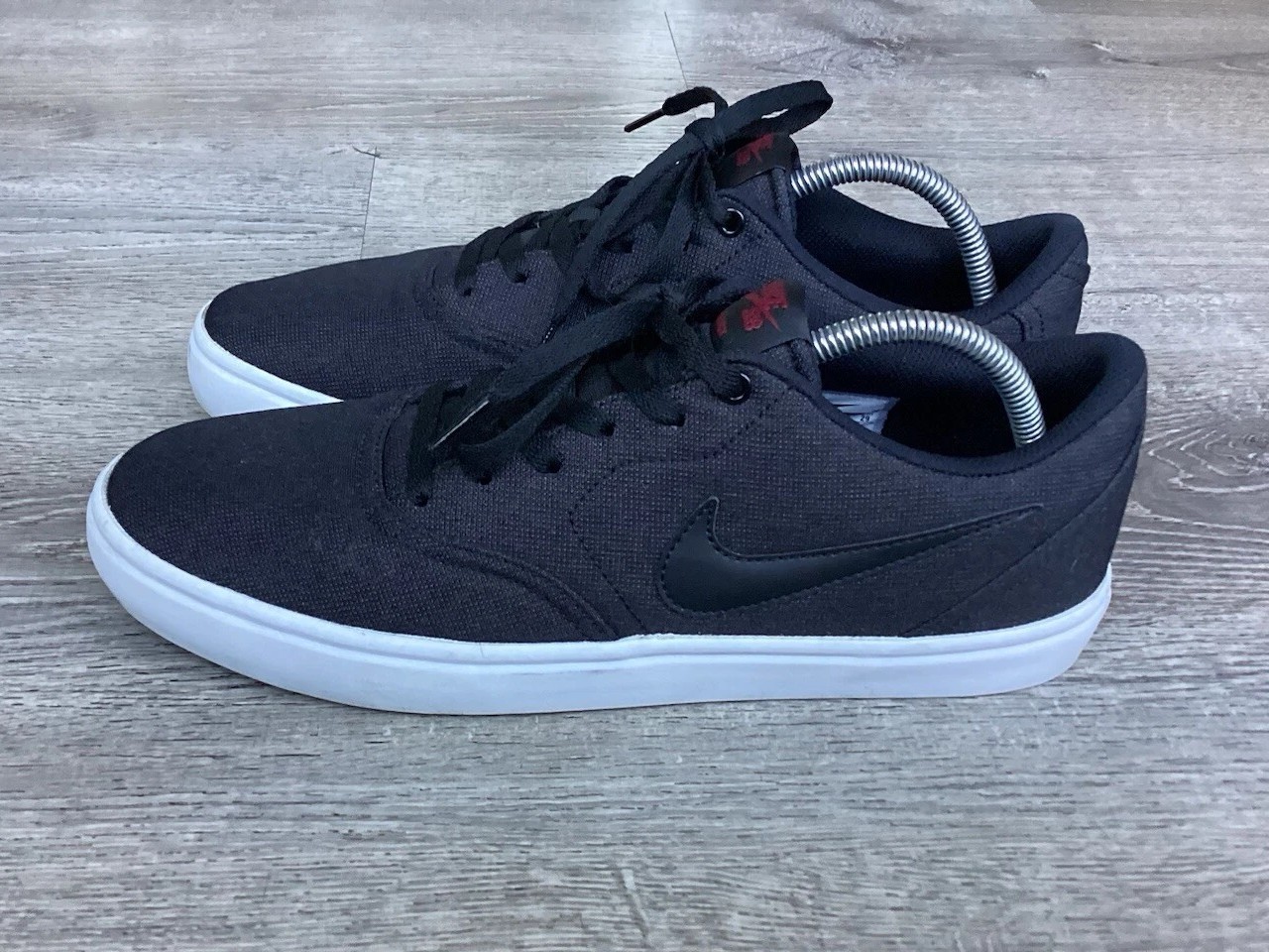 SAOLA Scarpe da skate Nike da uomo taglia 11 SB Check Solar sneakers nere in tela 843896 007