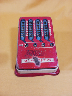 #ad VINTAGE WOLVERINE SUPPLY CO TIN PLATE ADDING MACHINE $15.00