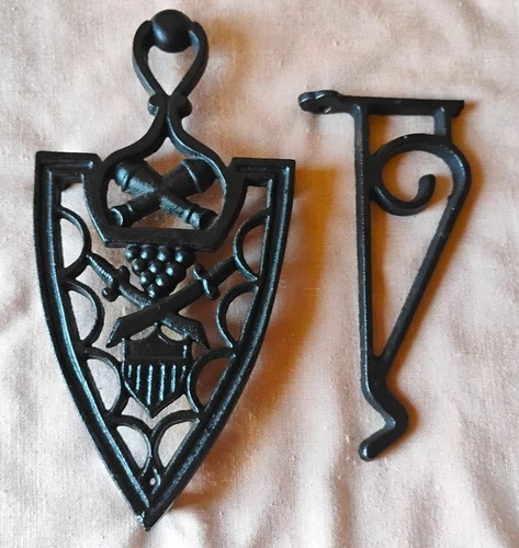 Cast Iron Shield Shaped Trivet Black with Raised Feet 8x4x1 + Iron Hook - product listing photo