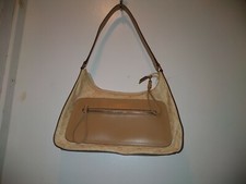 Liz Claiborne tan clutch purse  zip front, zip pocket inside and three pockets
