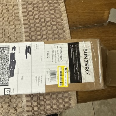 Sun Zero Cordless White100% Blackout Textured Fabric Roman Shade