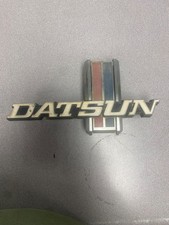 Used Datsun 620 Truck Grille Emblem With Mounting Hardware