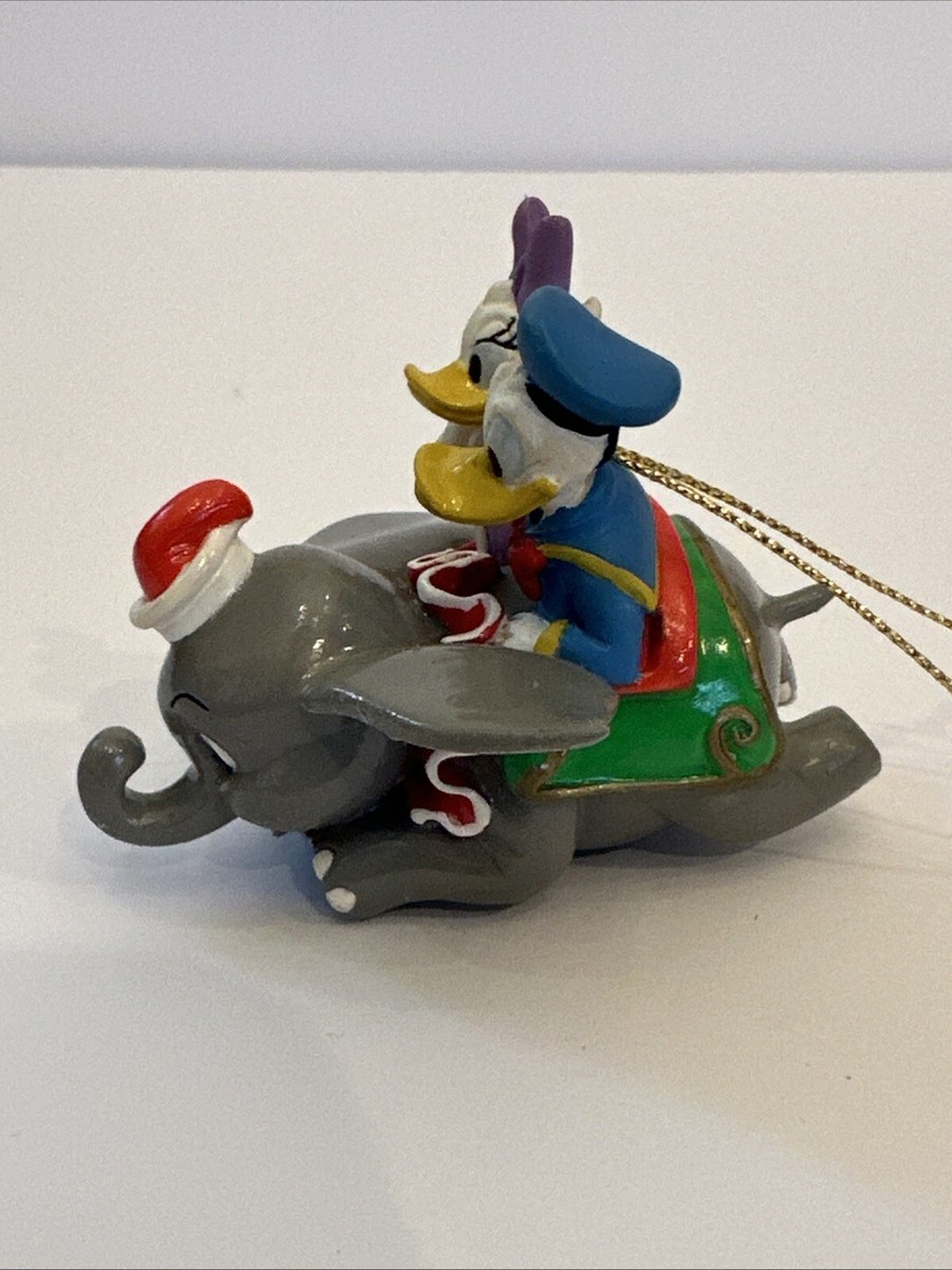 The Disney Artist Collection Dumbo Ride Daisy & Donald Duck