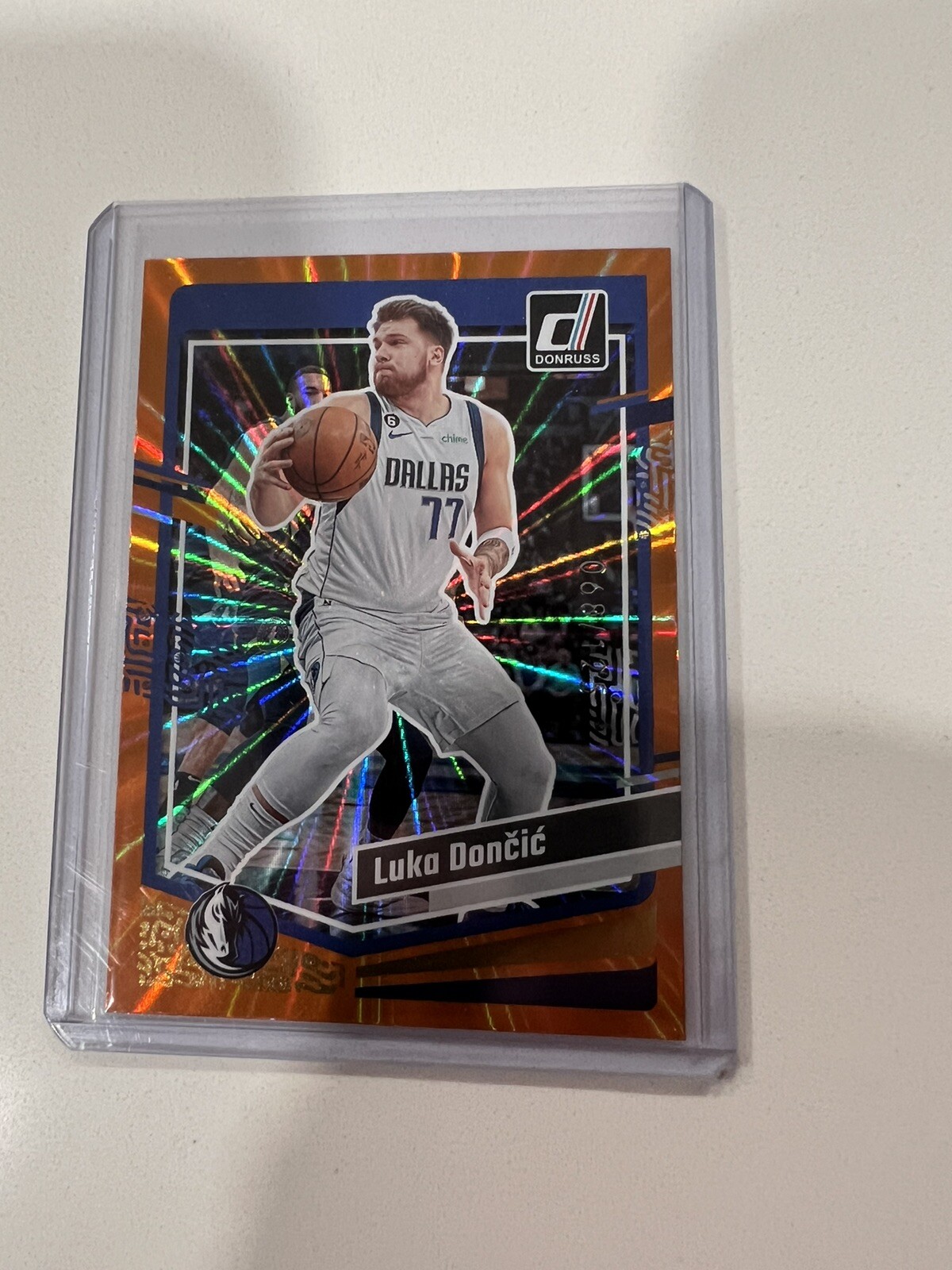 2023-24 Donruss Holo Orange Laser #141 Luka Doncic 060/125
