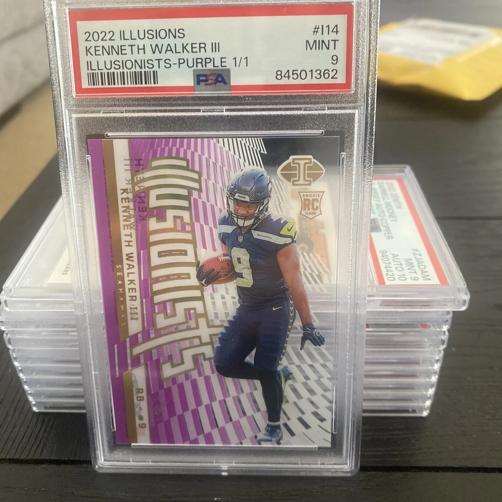 Kenneth Walker III Panini Illusions Illusionists #I14 Purple 1/1