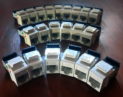 Lot of 21 Leviton Cat5e+ GigaMax UTP  Jacks - 6 White, 15 Ivory T568 A/B