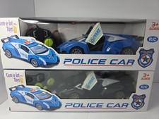 New In Boxes 2 RC Remote Control Police Cars 1:22 Ages 3 1 Blue  1 Black