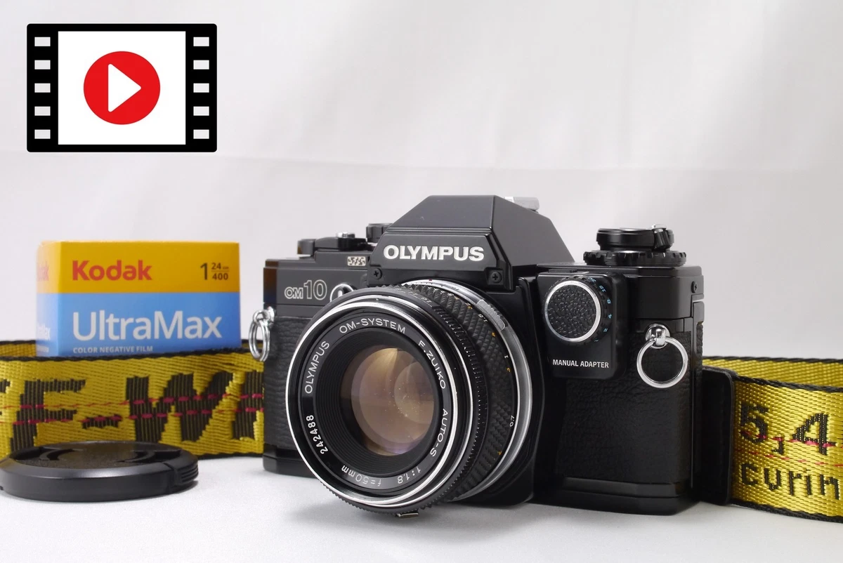 Appareil photo reflex argentique 35 mm noir OLYMPUS OM-1 M-SYSTEM F.ZUIKO 50m
