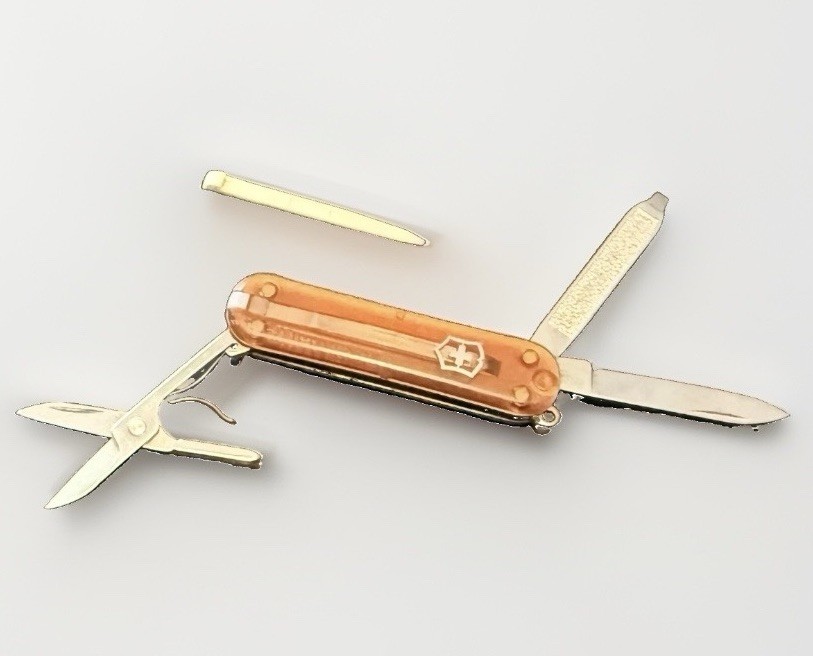 A translucent-handled vintage Victorinox Classic SD — tiny, iconic, and genuinely useful in a retro-cool package.