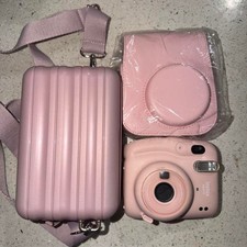 Pink Instax Mini 9 camera with 2 case and strap no battery cover