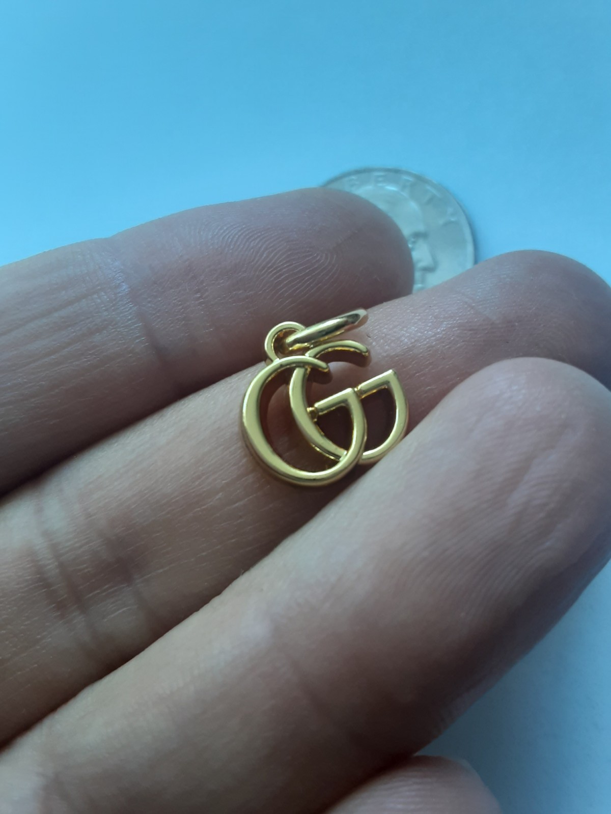 One  Gucci 1 pieces  Pendant  metal zipper pull   /  small gg 0,6 inch