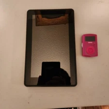 Amazon Kindle Fire 1st Gen 8GB HD 7in Black Wi-Fi + Sansa Mp3 Player