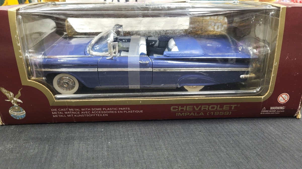 NIB 1959 CHEVROLET IMPALA CONVERTIBLE BLUE 1/18 DIECAST ROAD