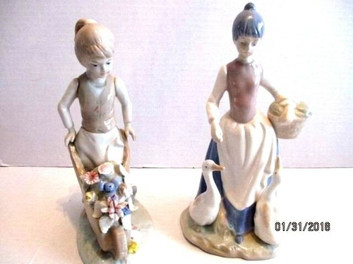 Lot 2 Glossy Porcelain Girl Figurines Girl W/Ducks and Girl W/Flower Cart - 第 1/11 張圖片