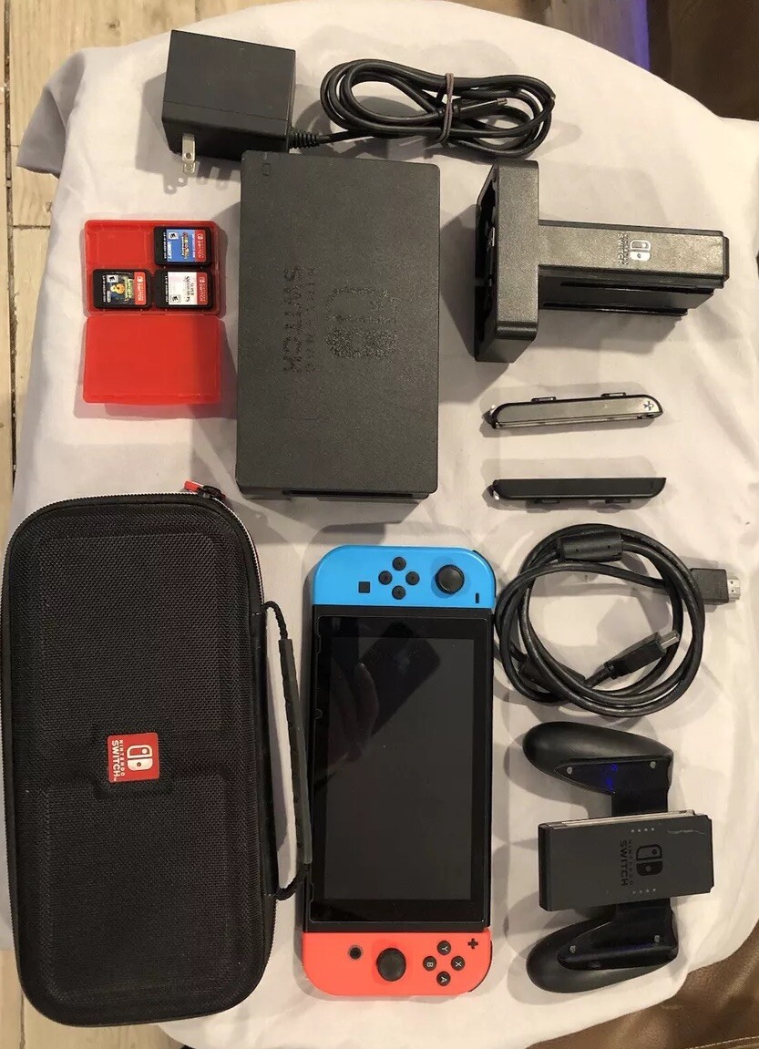 Nintendo Switch With Charge Base Games Charging Dock And Other Accessories￼
