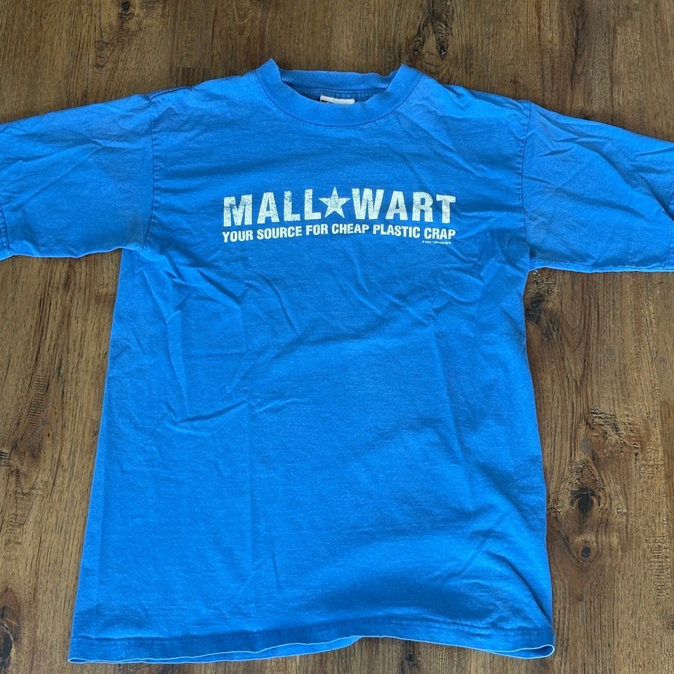 A deadpan jab at big-box retail culture — 'Mall-Wart' novelty tees are peak ironic thrift-store energy and make instant conversation starters.
