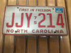 North Carolina NC License Plate 1975 w/ 1976 sticker “First In Freedom” JJY 214 — photo 1