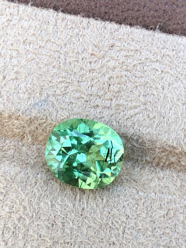 7.20 Carat Oval Cut Pakistani Peridot With Ludwigite Inclusions, Ring Size - Picture 6 of 8