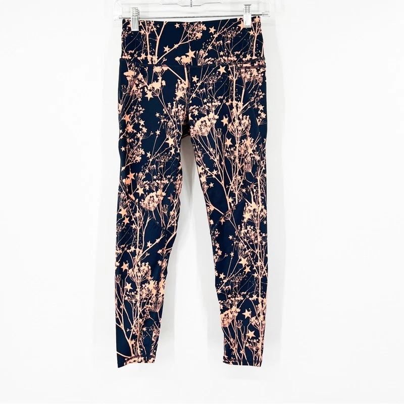 sweaty-betty the power coral orange star floral print leggings
