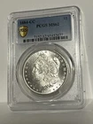 1884 CC MORGAN SILVER DOLLAR PCGS MS 62