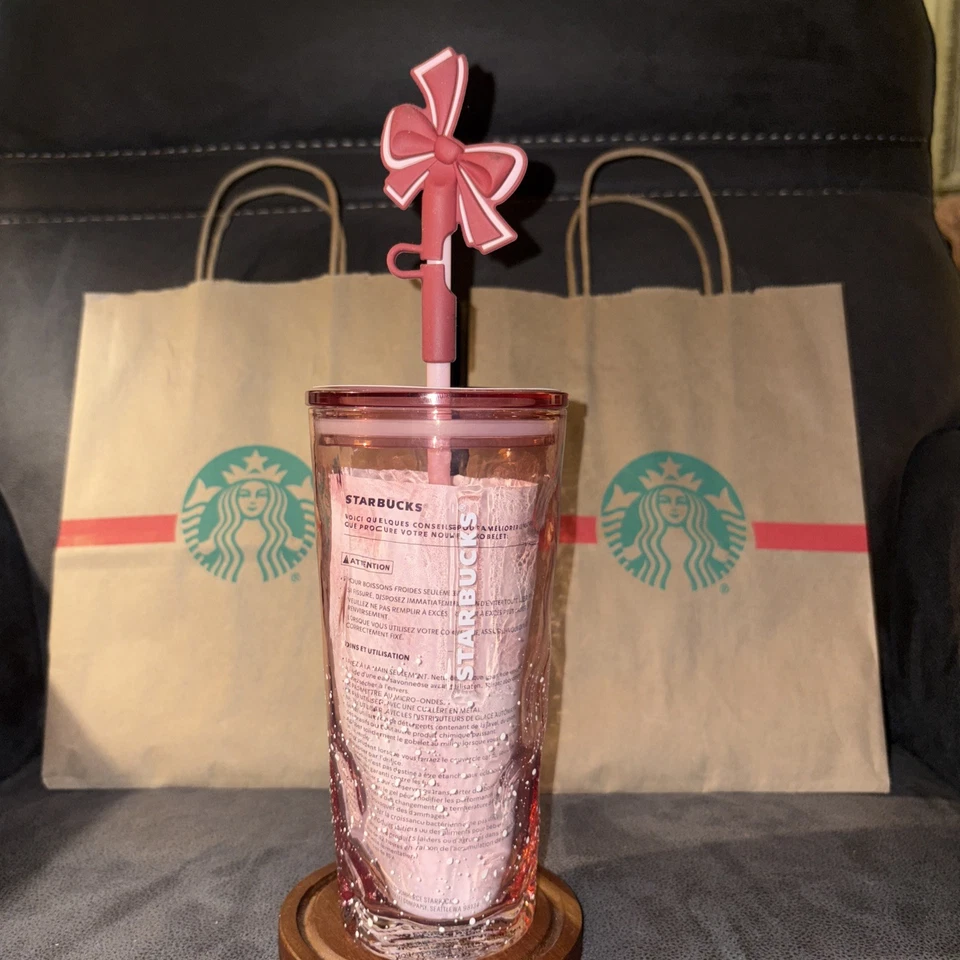 Starbucks Rosa Vidrio de Nieve Vacaciones Arco Silicona Topper Taza Vaso 18 Oz 2025 Foto 3 de 4