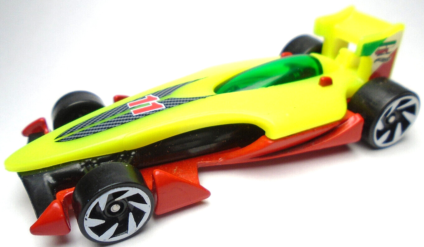 2016 HOT WHEELS SPEEDY PEREZ #11 YELLOW & RED 1:64 DIECAST 3" RACE CAR W/ GREEN