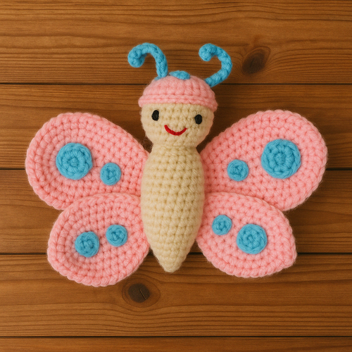 Handgefertigtes rosa Schmetterling Häkelspielzeug - weicher Plüsch für Babys Kinder & Kleinkinder - Bild 2 von 8