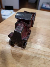 A.C. WILLIAMS CAST IRON MACK STAKE TRUCK WITH BED