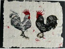 White/black Rooster pair