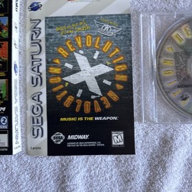 Revolution X (Sega Saturn 1997)  Manual w/ Reg And Insert NO CASE Disc NM