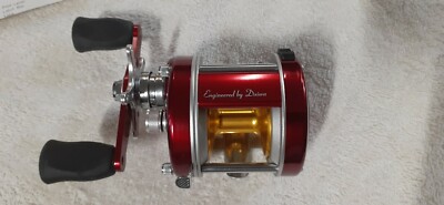 A Daiwa Millionaire 6HM casting reel, in original box