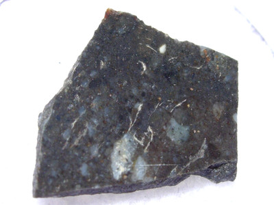 .885 grams NWA 17270 Lunar (melt breccia) Meteorite slice from the Moon with COA