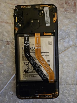 Samsung Android Smartphone. No charger cord. Untested as is. Cracked no back
