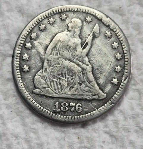 1876 CC Seated Liberty Quarter! Estimated Very Fine 20. Die Break. Video M0082.