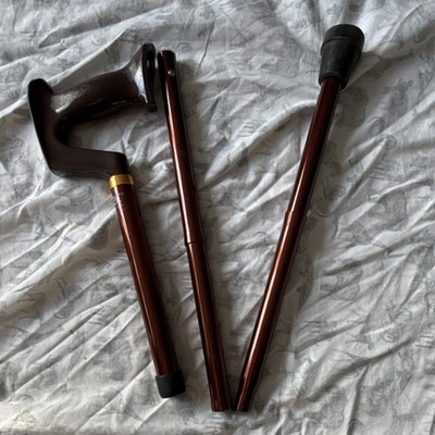 Brown Foldable Walking Cane with Ergonomic Handle and Rubber Tip