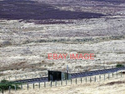 PHOTO  PLATE-LAYERS' HUT BESIDE THE NORTH HIGHLAND LINE TYPICAL WOODEN CONSTRUCT