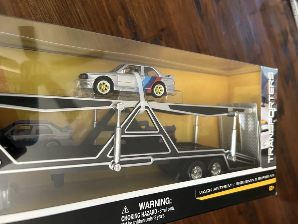 Transporter Mack Anthem and 1988 BMW M3 1:64 Scale Diecast Model Silver Maisto - Image 2 of 4