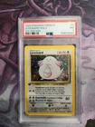 Pokemon French Chansey 003/102 Base Set Holo 1st Edition PSA 7 NEAR MINT