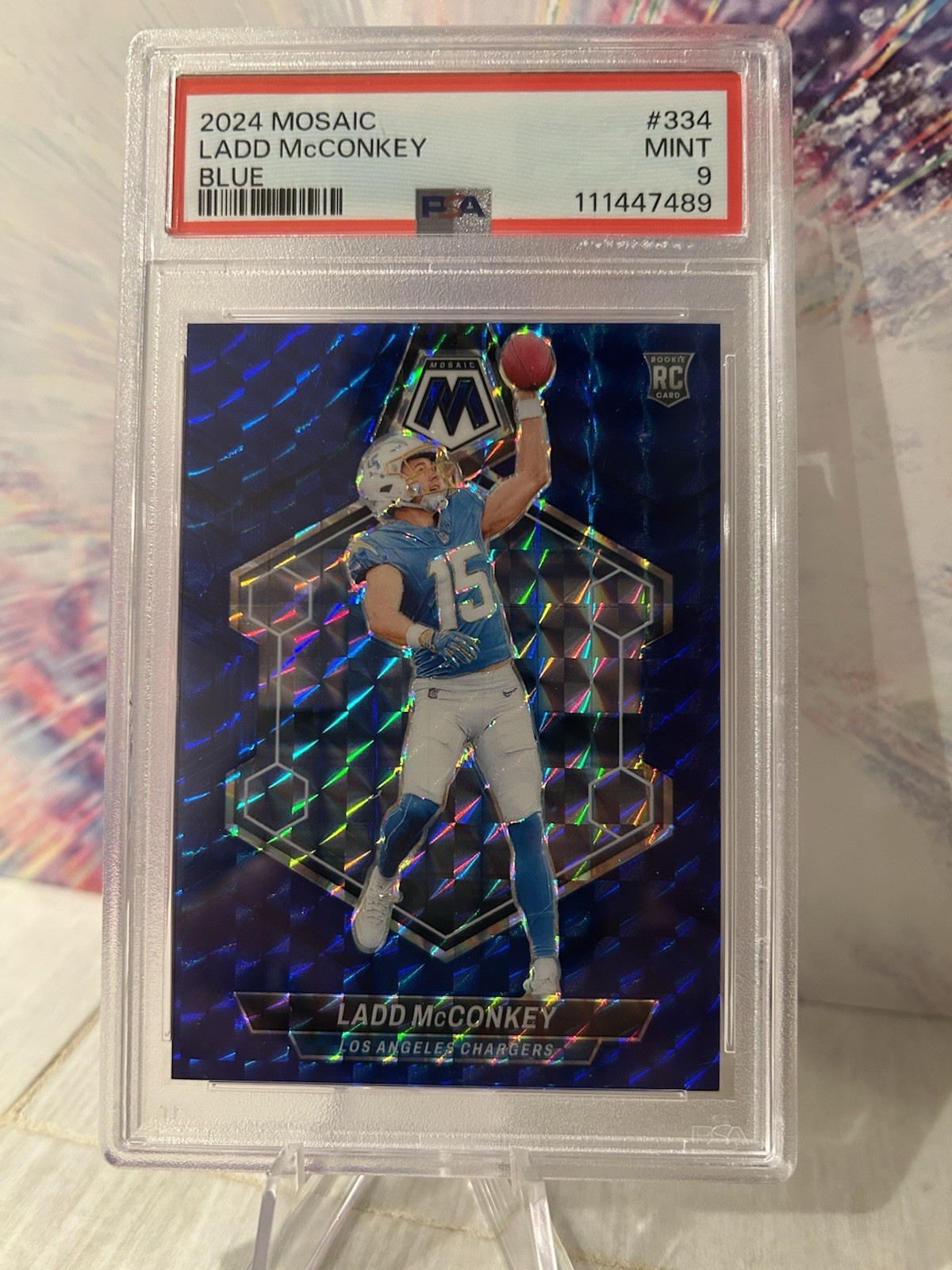 2024 Panini Mosaic Ladd McConkey #334 Blue Mosaic Prizm /99 RC PSA 9