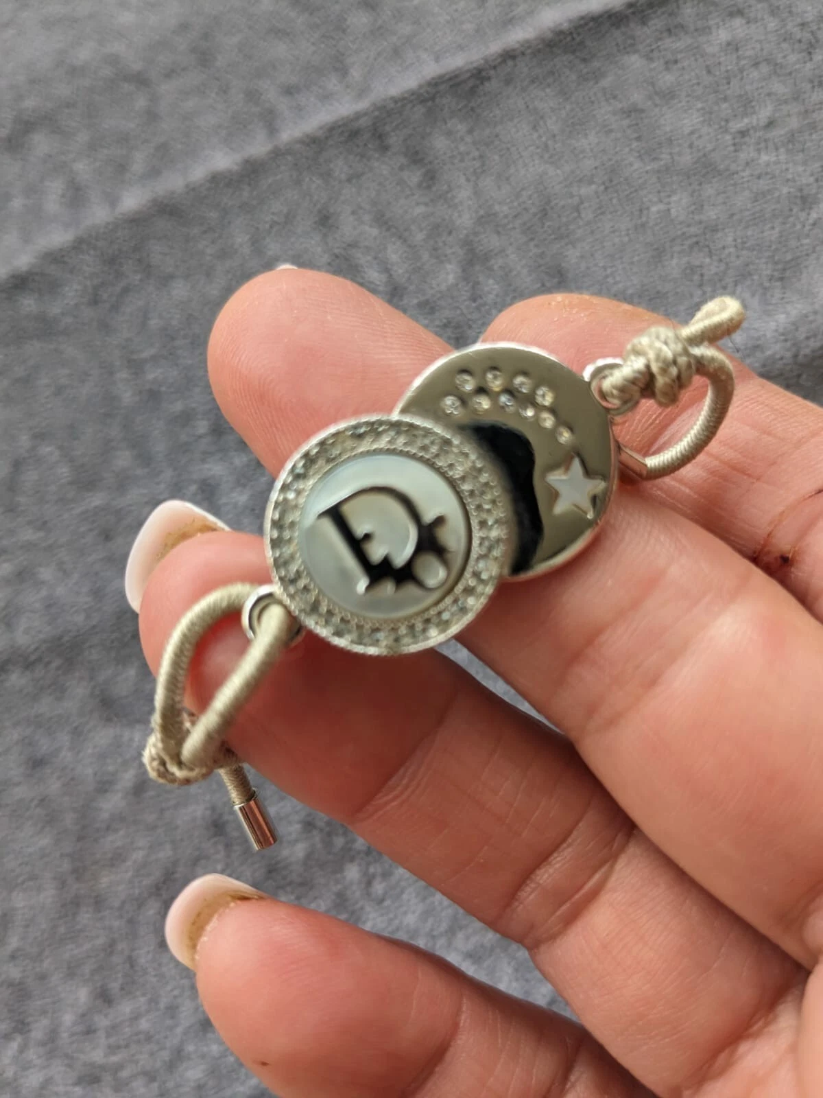 Bracciale Dior con due monete ad incastro. Grande Ckndition