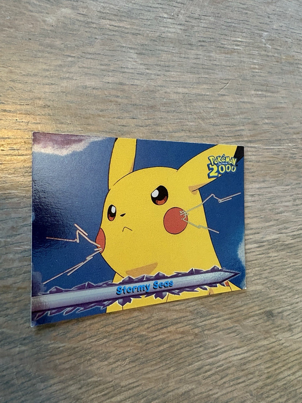 Pikachu Topps Pokemon The Movie 2000 Card #19 Stormy Seas - Good Condition  Holo
