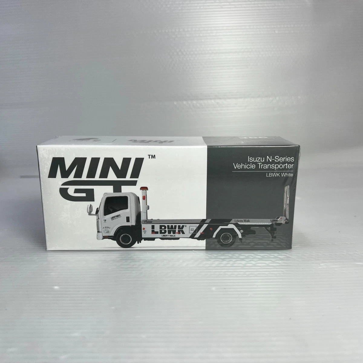 Isuzu N-Series Transporter 1/64 ミニカー PREORDER* MINIGT 1:64 Isuzu N-Series Vehicle Transporter