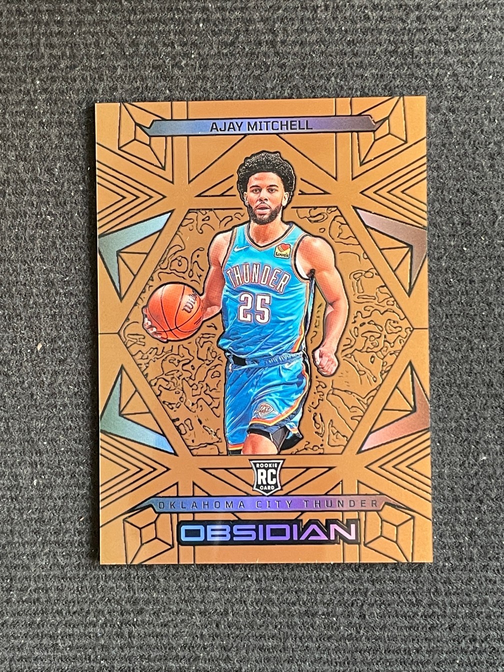 Ajay Mitchell 2024 Obsidian #147 Electric Etch Bronze Flood /99 