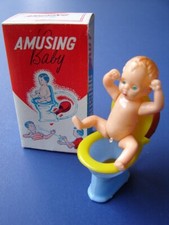 Vintage 1950's Celluloid Amusing Trick Peeing Baby On Toilet NIB Novelty Gag
