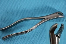 NEW GERMAN STEEL DENTAL EXTRACTING FORCEPS # 217 DENTAL SURGICAL INSTRUMENTS-