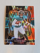 2025 Panini Select - Premier Level Travis Hunter #128 Black & Red Shock Prizm RC